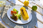 Grilled corn on the cob with salad