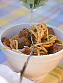 Linguine with meatballs and tomato sauce