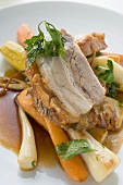 Roast belly pork with crackling and root vegetables