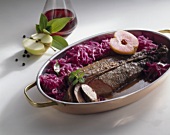 Saddle of venison with red cabbage and apples