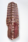 Raw pork fillet with ribs and chine bone