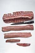 Raw pork fillets, ribs and chine bone