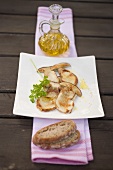 Fried cep slices with parsley, olive oil and bread