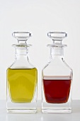 Olive oil and vinegar in small glass bottles