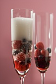 Sparkling wine cocktails with liqueur and berries
