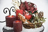 Christmas decorations on snow-covered garden table