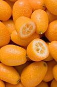 Many kumquats, one halved