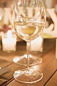 Glass of white wine on Christmas table
