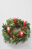 Advent wreath with four burning candles