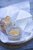Sheep's cheese and bread on paper