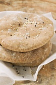 Flatbread with sesame seeds, stacked