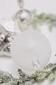 White Christmas bauble and silver decorations