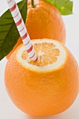 Orange with straw