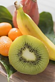 Exotic fruit still life with kiwi fruit, kumquats, banana