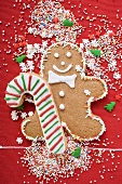 Gingerbread man, candy cane biscuit and sprinkles