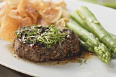 Peppered steak with cress, green asparagus & potato crisps