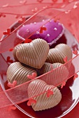 Purple fabric heart and chocolates for Valentine's Day