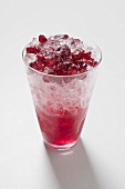 Pomegranate juice with crushed ice and pomegranate seeds