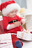 Baby with Christmas gifts