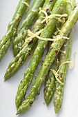 Roasted green asparagus with lemon zest (overhead view)