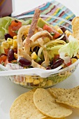 Mexican salad with tortilla chips to take away