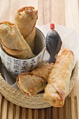 Crispy spring rolls with soy sauce to take away (Asia)