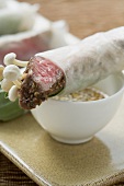 Rice paper rolls filled with beef & mushrooms, sesame sauce