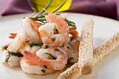 Fried prawns with rosemary and sesame grissini