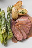 Duck breast with green asparagus and rosemary potatoes