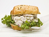 Chicken salad sandwich with red onion