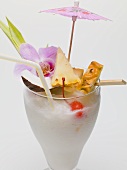 Long drink made with coconut milk, with pineapple