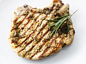 Grilled pork chop with rosemary