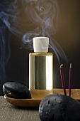 Scented oil, incense sticks and healing stones