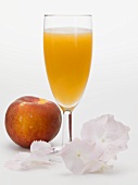 Peach and sparkling wine cocktail