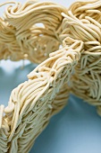 Egg noodles removed from the packaging (close-up)