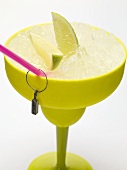 Frozen Margarita with lime wedges