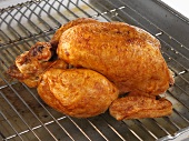 Whole roast chicken on rack