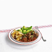 Meatballs with tomato sauce and vegetables