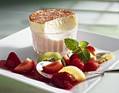 Ice cream soufflé with strawberry and kiwi fruit salad