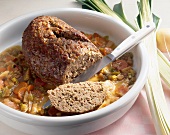Meatloaf with vegetable sauce