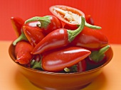 Red chillies in a red dish