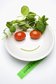 Vegetable face in a soup plate, label beside it