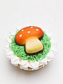 Cupcake with fly agaric mushroom for New Year's Eve