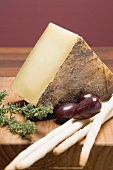 Pecorino with olives, thyme and grissini