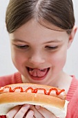 Child with hot dog