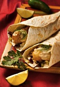 Tortillas with fish and dill filling and coriander