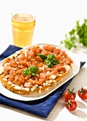 Mozzarella, tomato and basil on toasted bread