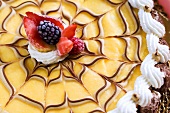 Blancmange cake with fruit garnish