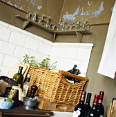 Various utensils, wine bottles and glasses in a kitchen