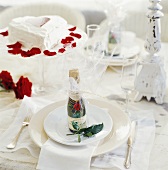 Elegant table with piccolo and heart-shaped cake